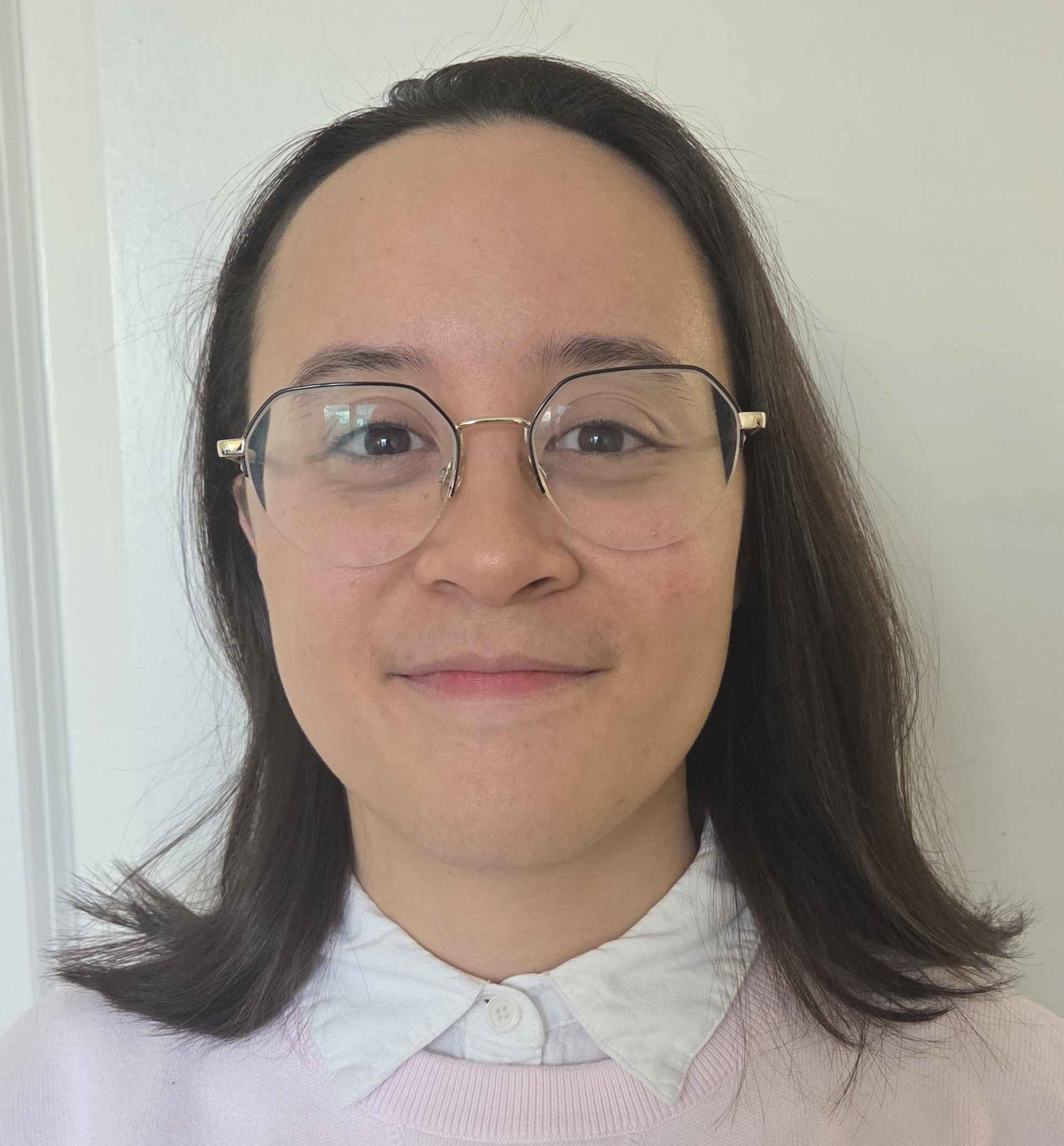 A professional photo of Alia Benitez.