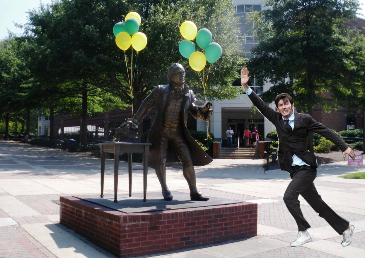 David Tennant as the 10th Doctor, running past the George Mason statue on Fairfax Campus.'